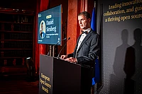 Daniel Stenberg, European Open Source Academy President, speaking at podium during European Open Source Awards ceremony
