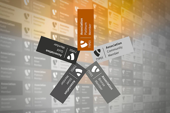 Five TYPO3 Association membership badges (Platinum, Gold, Silver, Bronze, Community) arranged in a star pattern, with a blurred background of similar cards in shades of gold, grey, and white.