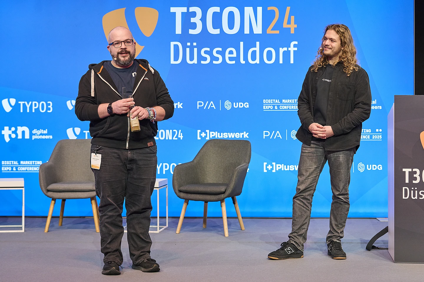Martin Helmich and Maximilian Hafer speaking at T3CON