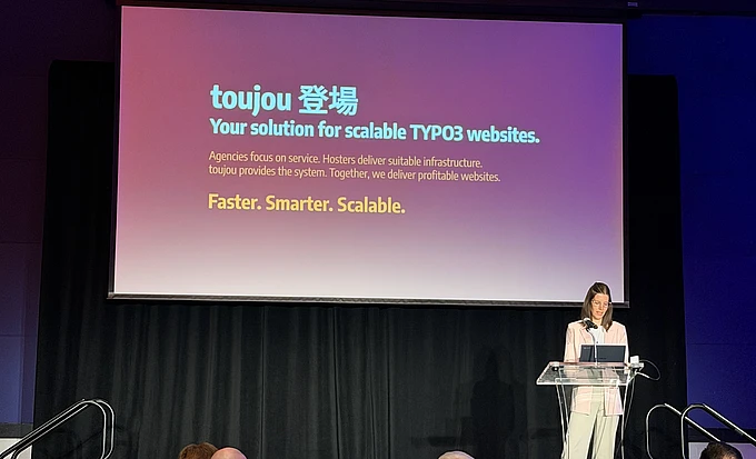 A woman presenting at the TYPO3 North American Summit.