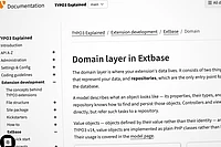 A computer screen displays documentation for TYPO3, specifically about the Domain layer in Extbase, with navigation links on the left and descriptive text on the right.