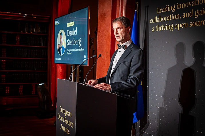 Daniel Stenberg, European Open Source Academy President, speaking at podium during European Open Source Awards ceremony